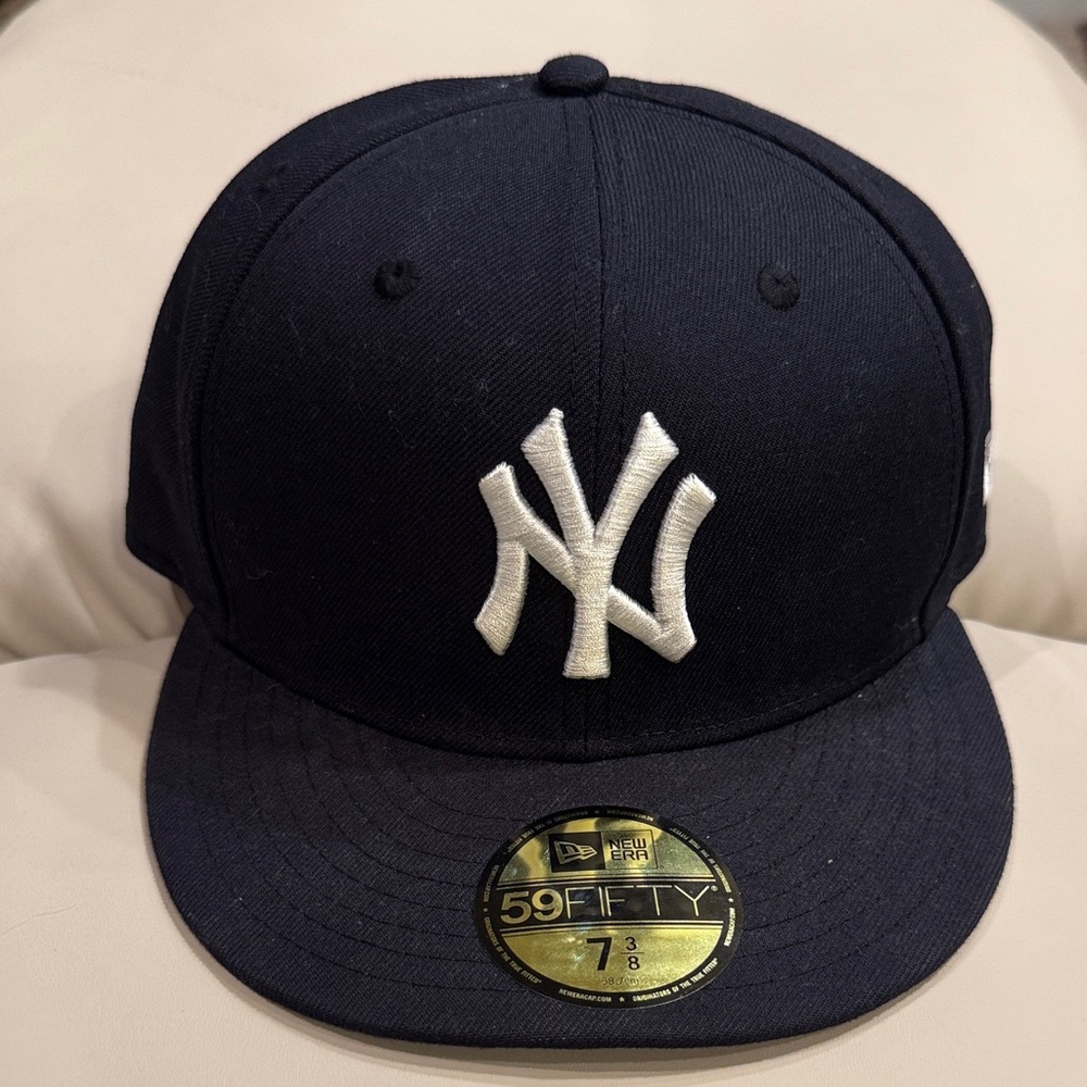 New Era Dark Blue Cap with White Emblem